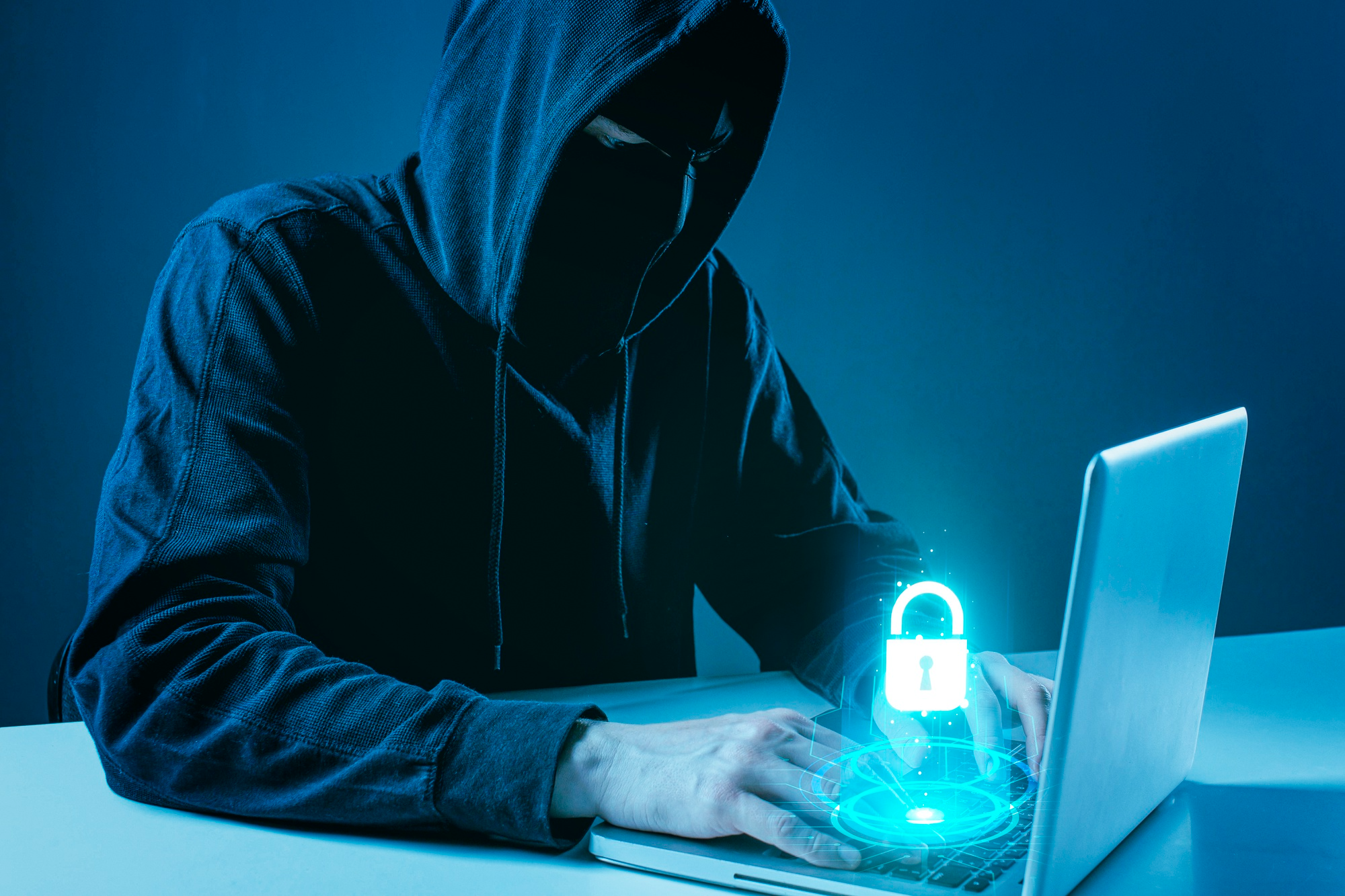 A hacker trying to hack into a protected system.